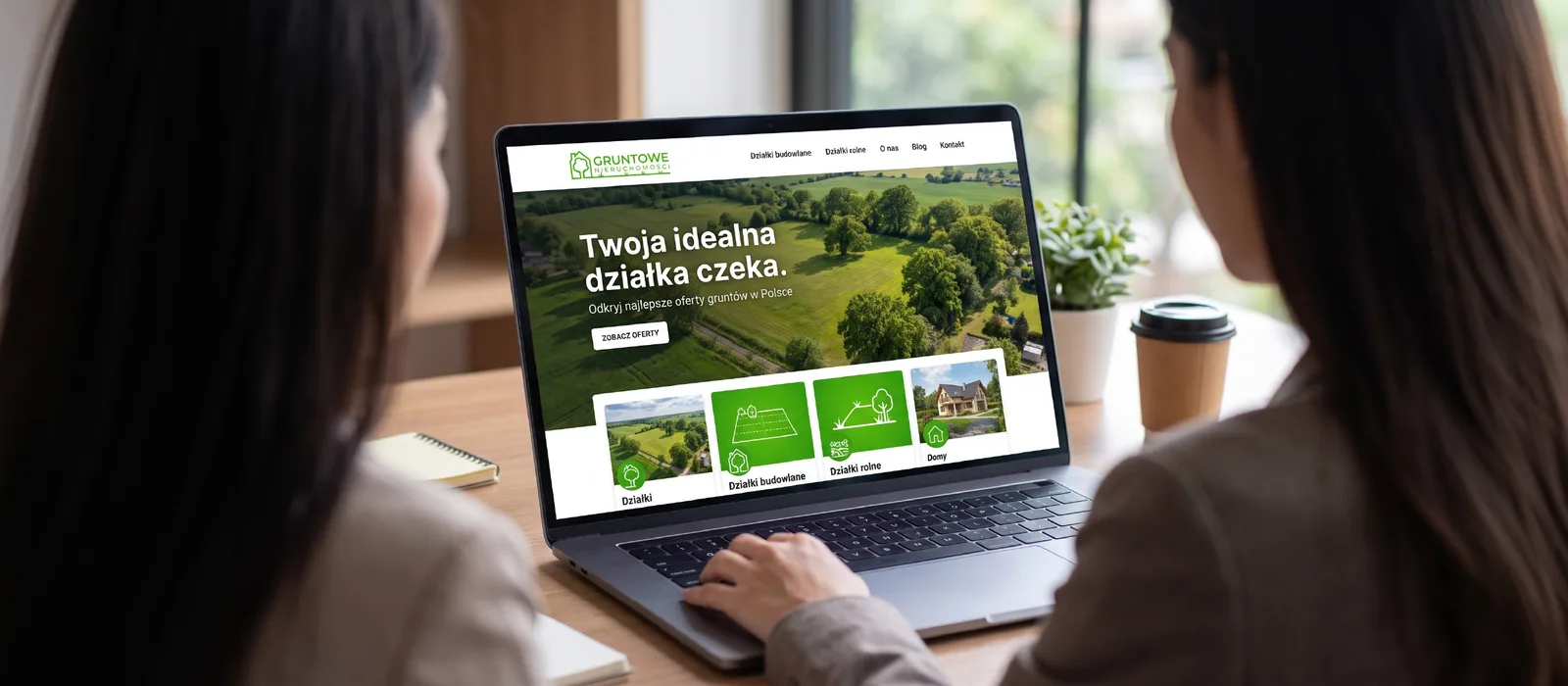 Mockup strony internetowej Gruntowe Nieruchomości zaprezentowany na laptopie